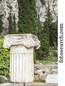 Ruins of a column and capitol; Delphi, Greece