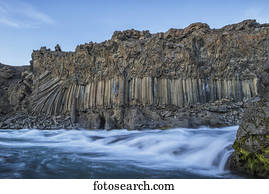 The basalt column and waterfall known as Aldeyjarfoss in Northern Iceland; Iceland