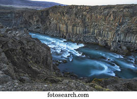 The basalt column and waterfall known as Aldeyjarfoss in Northern Iceland; Iceland