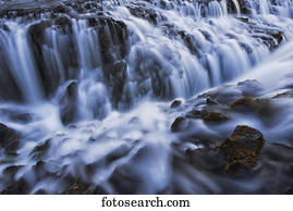 Water cascading over rugged rocks, Bruarfoss; Iceland