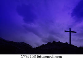Cross on hillside
