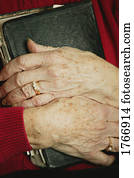 Senior holds a Bible Senior holds a Bible