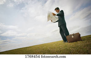 Businessman in field