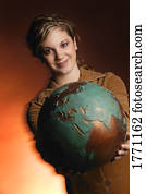 Globe held by woman