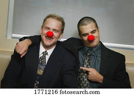 Two Businessmen being silly wearing red noses