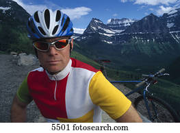 Mountain biker with mountainous backdrop