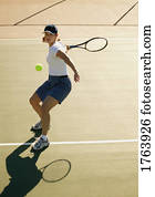 Woman playing tennis