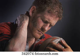 jogador rúgbi, segurando bola