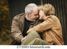 Couple with heads touching