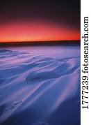 Colourful snowscape and sunset