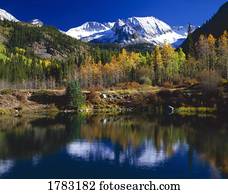 Pond reflects mountains, Castle Creek Valley