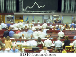 Brokers in stock exchange trading floor 