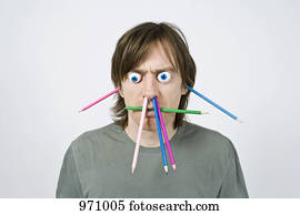 Bizarre man with pencils 