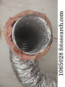 An open air duct pipe with insulation around it