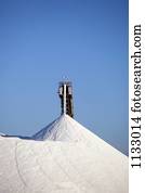 Mining machinery unloading salt at a salt mine