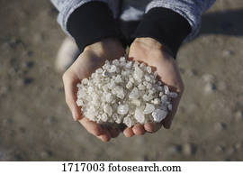 Low section of person holding salt