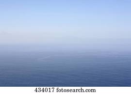 A foggy horizon over the sea