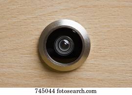 Door peephole, extreme close-up