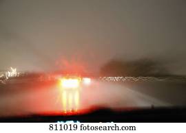 Multiple lane highway, night, non-urban scene