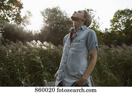 A woman enjoying the outdoors, non-urban scene