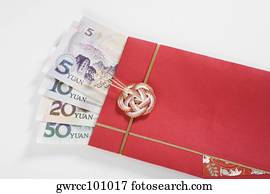 Chinese currency in a red envelope