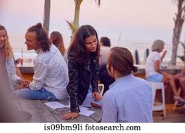 Friends at party by beach, Plettenberg Bay, Western Cape, South Africa