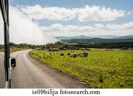 Landscape view from rural highway with low cloud over valley, South Africa