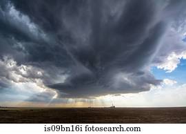 Rotating, tornado-warned storm develops pretty striations over Collyer, Kansas