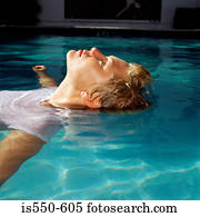 Young woman in swimming pool