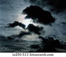 Silhouetted clouds in sky