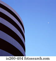 Curved building and clear sky