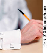 Man wearing a square cuff link