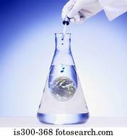 Scientist adding chemical to the world