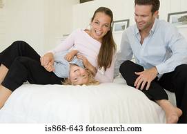 Family on bed