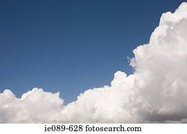 A cloud and blue sky
