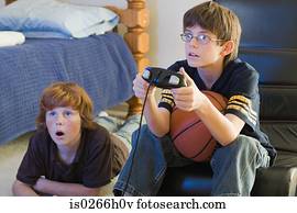 Two boys playing a computer game