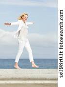 Carefree woman by the sea