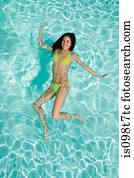 Young woman in swimming pool