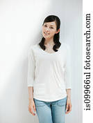 Woman wearing white top, portrait