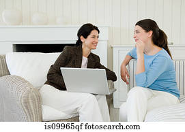 Young woman meeting financial advisor at home