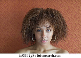 Portrait of a young woman looking sultry