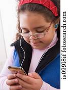 Young girl listening to music