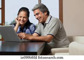 Old couple with a laptop