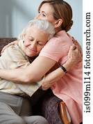 Daughter and senior mother embracing