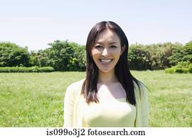 Mid-adult woman in a field