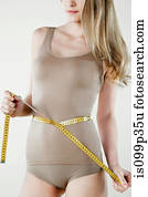 jonge vrouw, het meten van taille, met, rolmeter