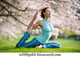 Woman in pigeon yoga position