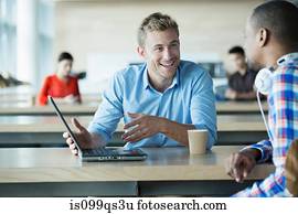 Young men discussing idea