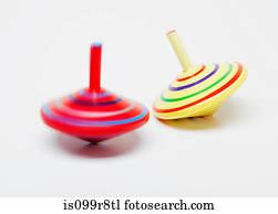 Spinning tops in motion