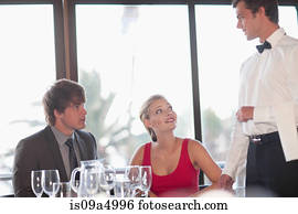 Couple having dinner at restaurant